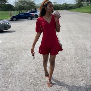 Red v-neck mermaid bottom.